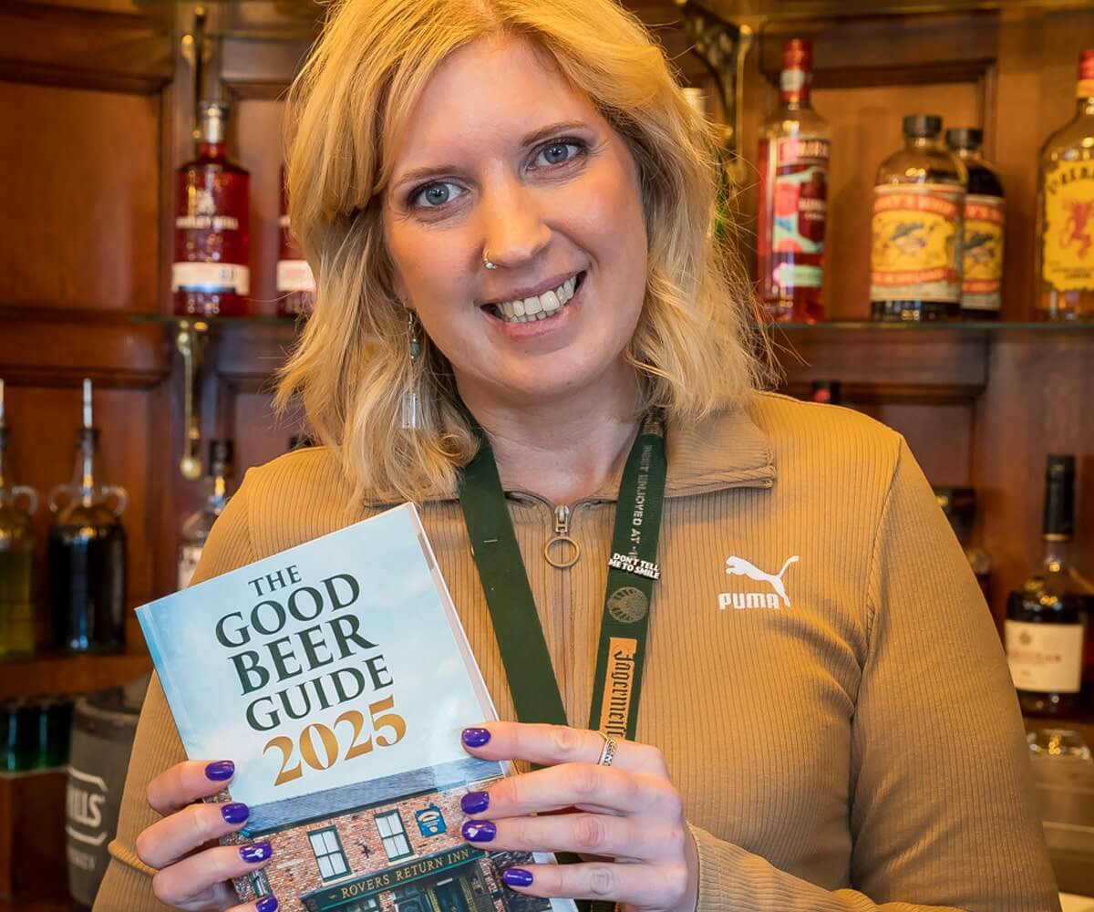 katie with the good beer guide 2025 real ale pubs in stoke on trent